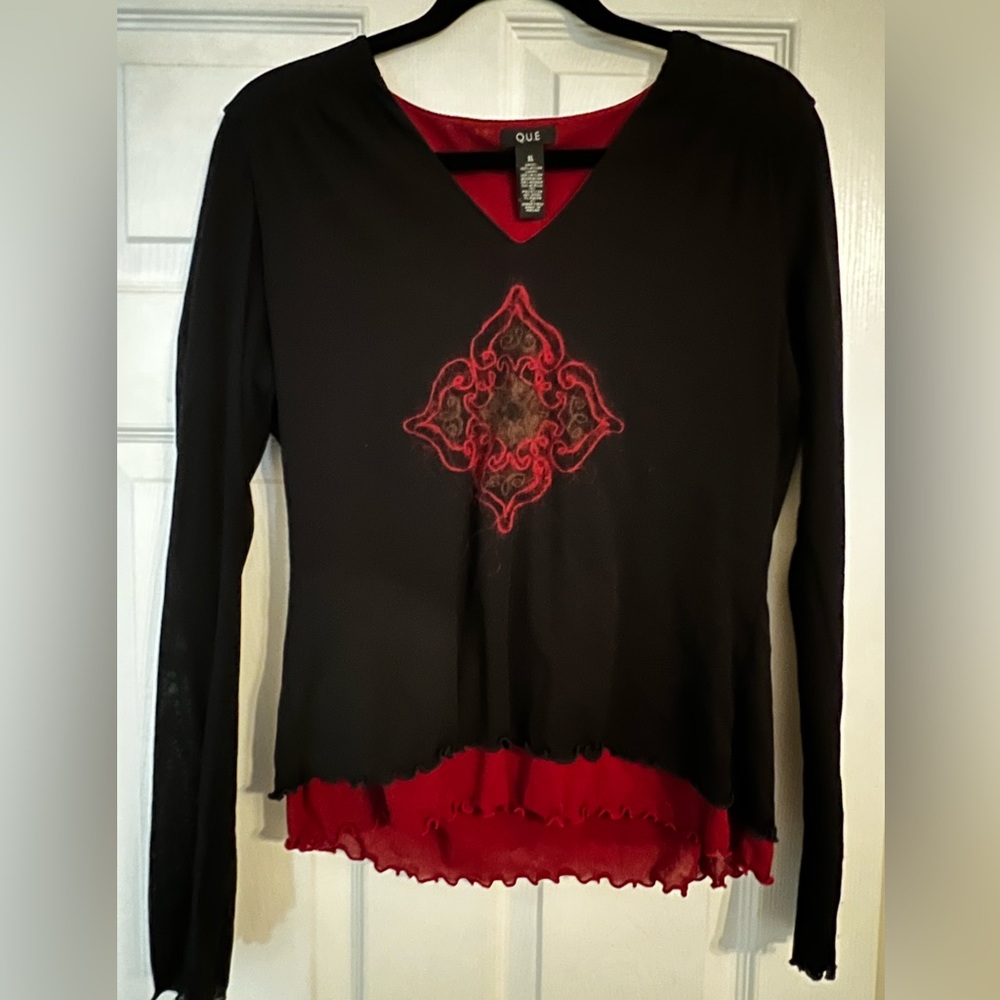 Que long sleeve top